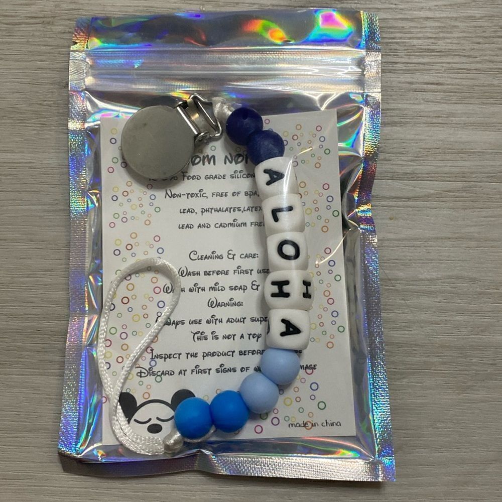 NEW- ALOHA- bead letters- pacifier clip. Blue